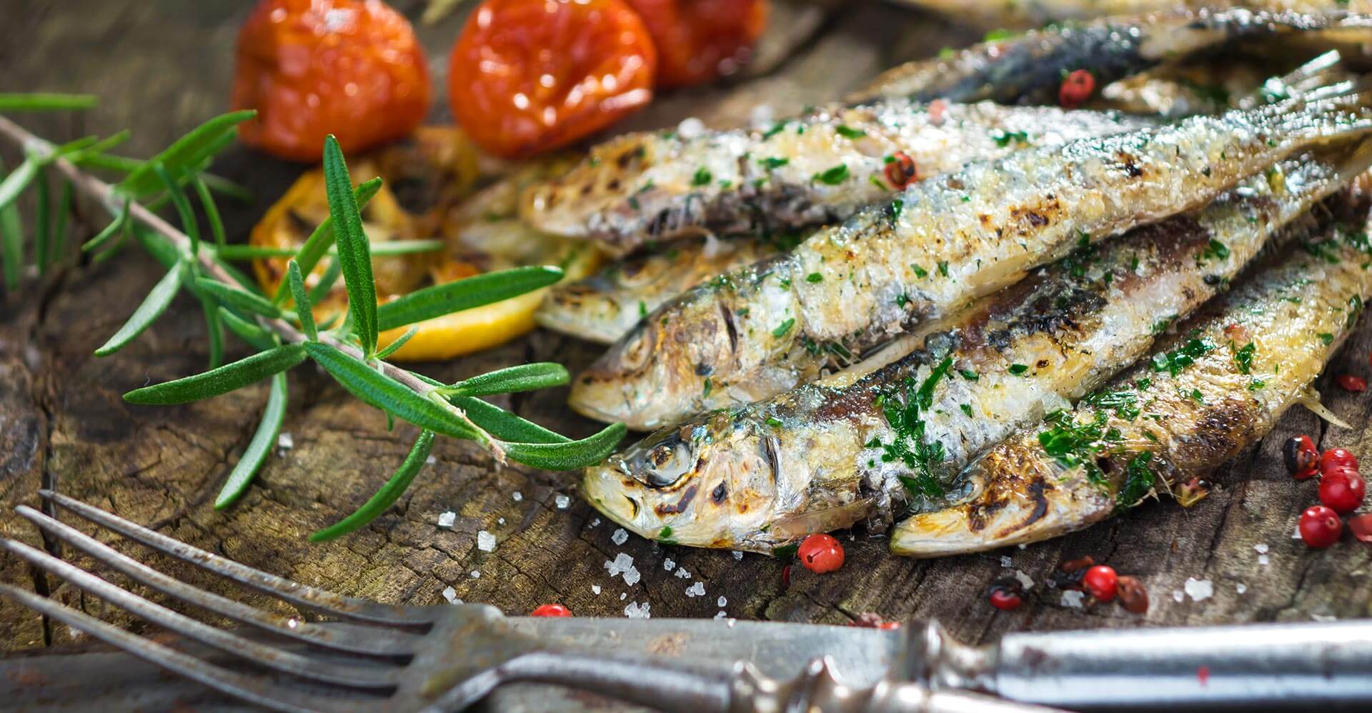 Oven-baked sardines with aromatic herbs